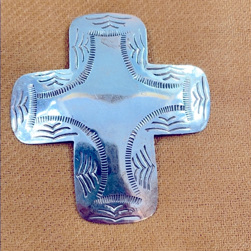 Sterling silver cross.